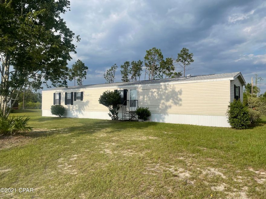 If you're looking for country living this is it. Move in ready 3 bedroom 2 bathroom home on a half acre lot. Split bedroom floor plan. Master bedroom has large walk in closet and master bathroom has a large soaker tub and seperate shower. The kitchen, dining room, and living room are nice and open giving the home a larger feel. On the back there is a large screened in porch. Has newer roof and new ac. Make an appointment today it won't last long

All measurements approximate please verify if needed