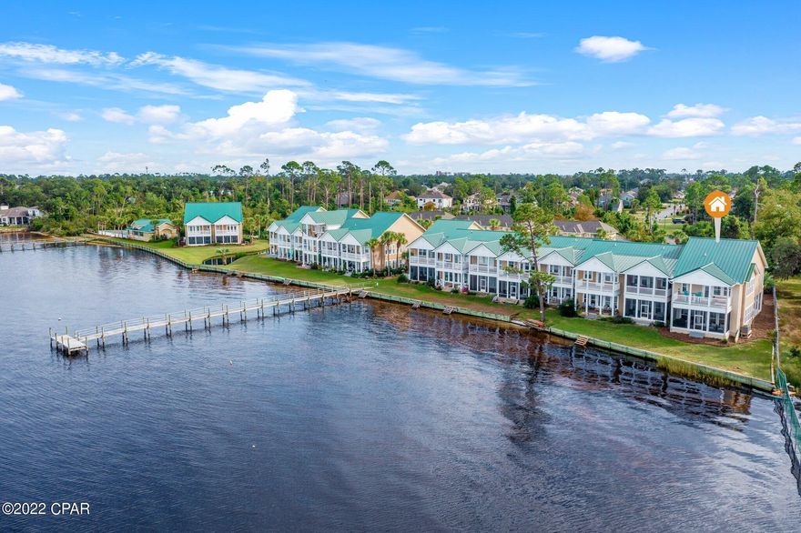 CURRENTLY UNDER CONTRACT, SELLER ACCEPTING BACKUP OFFERS. WATERFRONT TOWNHOME overlooking St. Andrews Bay. This beautiful 3 bedroom and 3.5 bath end unit offers Bayfront living with balcony from the master bedroom as well as a private bath and balcony for each guest bedrooms. The welcoming entry offers wet bar and open floor plan for living/dining which leads to a relaxing screened patio. Beautiful windows with Levelor electric shades. Just minutes from downtown St. Andrews, parks, golf courses, shopping at Pier Park and sandy beaches of the Emerald Coast. Paradise awaits you at Pelican Bay.