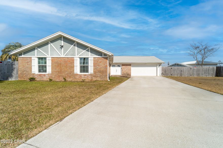 This 4 bedroom, 2 bath (plus bonus room) home features a spacious open floor plan in the kitchen and living room area. The craftsman style brick home was completely remodeled following Hurricane Michael in 2018-2019.



This home has a brand new roof, LVP flooring throughout, new doors, windows, stainless steel appliances, quartz countertops, cabinets, and bathroom vanities! In addition, the fence, well pump, tankless hot water heater and outdoor sprinkler system are also BRAND NEW! Additional add-ons include a security camera and an alarm system.



The backyard of the home features a ten foot privacy fence and a screened-in porch, perfect for entertaining guests and having cook outs. This house is conveniently located to restaurants, shopping, and other amenities that Panama City has to offer. This home won't last long on the market. All measurements are approximate, buyer to verify if important.