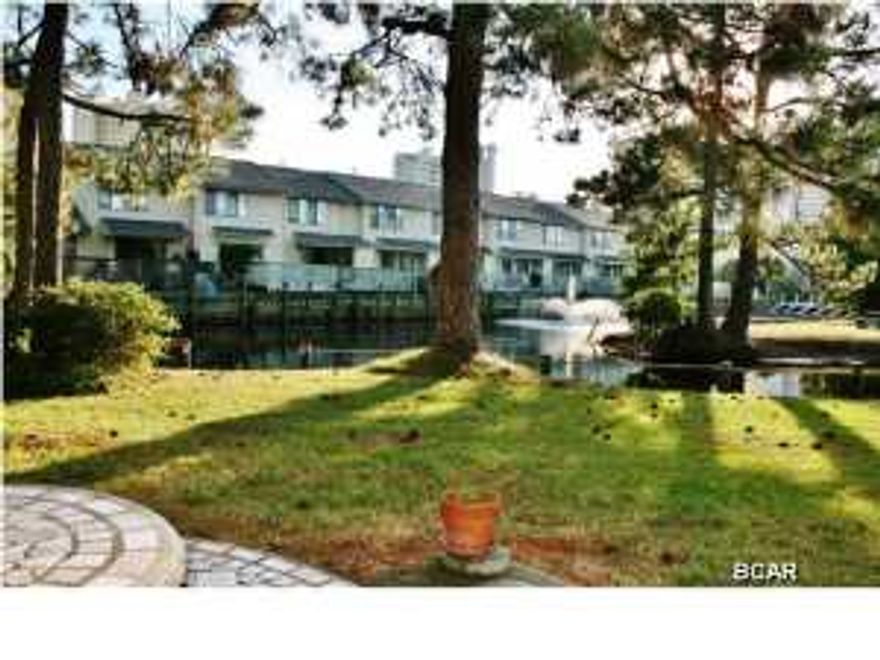 Very nicely located ''Glassback'' Townhouse in Gulf Highlands Beach Resort. This 2 Bedroom 2.5 Bath unit backs up to the Canal. You can sit out back and Relax by the Canal or you can invite all your Friends over for that ''to be remembered'' Cookout. The Kitchen is plenty big to fix all those big meals. The Dining area has plenty of seating for your Guest. You can enjoy the view of the Backyard and Canal from the Living Area that opens up to the Patio. There is even a 1/2 Bath Downstairs, so your Guest don't have to go upstairs. Each Bedroom upstairs has its own Private Bath. There is also a Storage Area outback to keep all those ''Sandy'' items put up in.Nice quiet area at the end of the street. This ''Gated Resort'' features 11 Pools (5 Heated), 4 Tennis Courts (2 Lighte