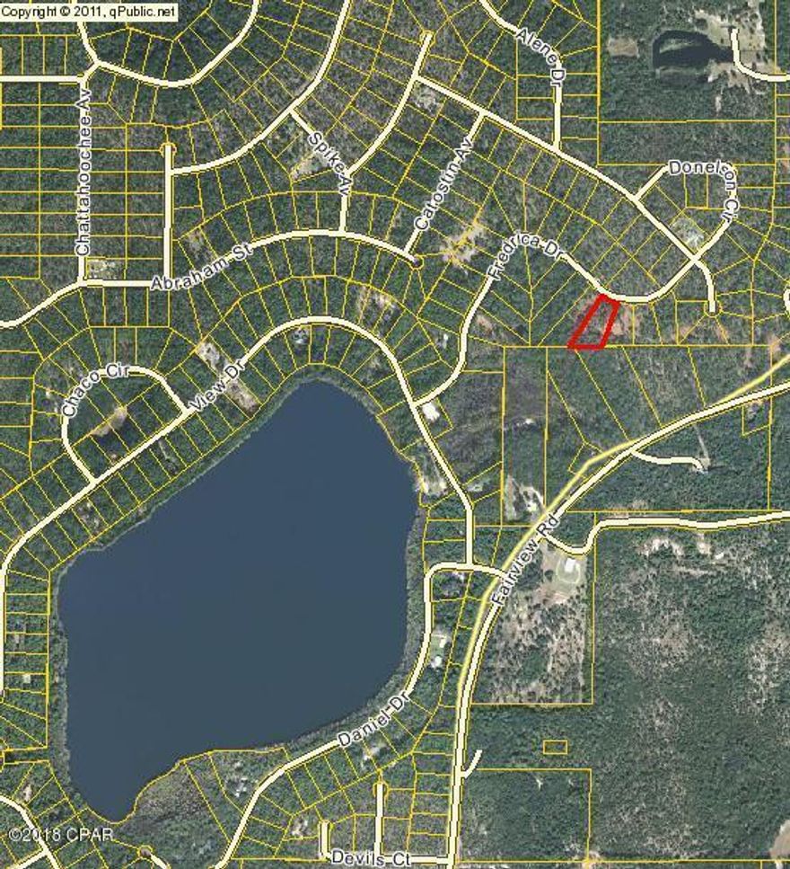 Wooded lot with beautiful view. Close drive, walk, or golf cart ride to McCormick Lake for swimming, boating or fishing. Property owners have access to Compass lake also for great fishing boating, jet ski's, swimming. Inground swimming pool, tennis courts and boat and cabin rentals also available for land owners to enjoy with their guests.