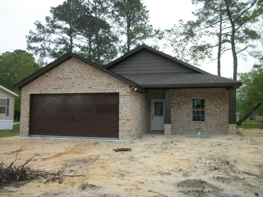 This will be a lovely three bedroom two bath home with raised ceilings, tile floor, and kitchen island.  It is still under construction so you can pick out your colors but this will pass soon.