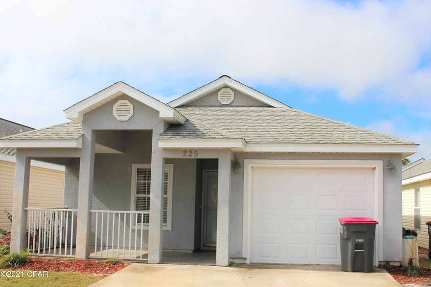 Centrally located home in Palm Cove subdivision on Panama City Beach.  Home features 3 bedrooms; 2 baths; living room; kitchen; laundry; one car garage and covered front porch.  Palm Cove is centrally located within one half mile of the beach and water park.  Community features 2 pools; playground; green areas, etc. with the HOA fees including trash pick-up and lawn maintenance.  Come take a look at this low maintenance home near the beach.