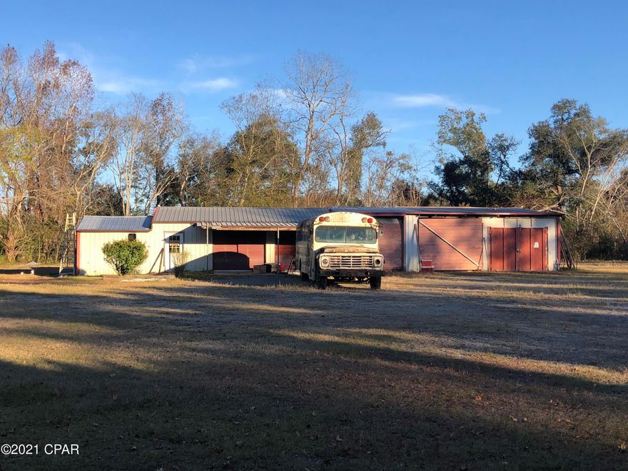 Mixed Use 2.5 acres (mol) in Cottondale.  Was for many years a Paint & Body Shop.  Owner retired.  Lot of storage room here and space for so much.  City water and sewer.