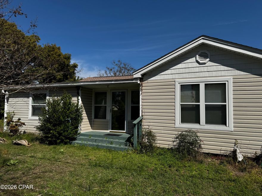 Perfectly located just a block from the water and minutes from everyday conveniences like shopping, restaurants, schools, and parks, this charming home at 220 Sherman Ave offers the ideal balance of lifestyle and location in the heart of Panama City. Originally built in 1925 and thoughtfully remodeled in 2016, this property blends classic character with modern updates while sitting on a strong concrete block foundation built to stand the test of time. Situated on a spacious 0.39-acre lot, the property offers far more than just a home--it offers possibilities. The lot was once divided into two separate parcels, presenting potential for future development or the option to build an additional home while maintaining privacy and space. Outside, the property truly shines with amenities rarely found this close to the water. A 20x30 workshop provides the perfect space for projects, storage, or hobbies, while two additional storage buildings, a massive carport, and a charming shed create endless opportunities for organization, creativity, and relaxation. Whether you're looking for a home with room to grow, space for hobbies and equipment, or future investment potential, this unique property delivers a rare combination of location, land, and versatility just steps from the water.