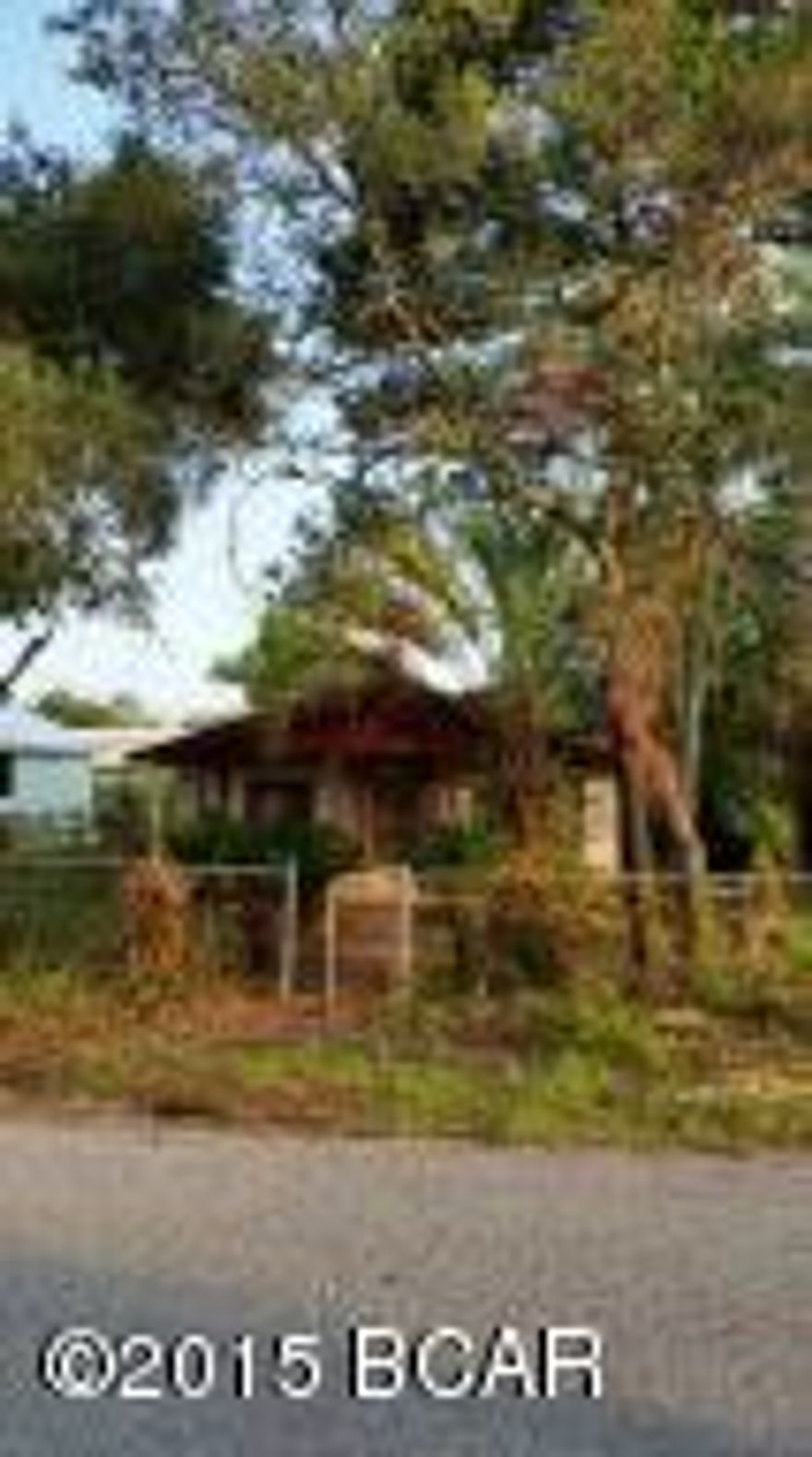 Short walk through very nice golf cart community to get to the beach access.Shady lot. New home just finished next door.