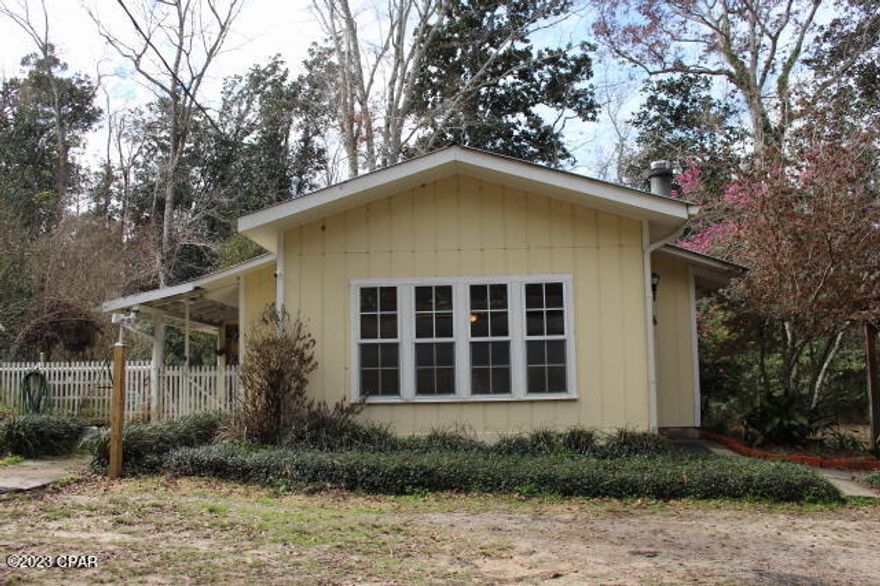 'CURRENTLY UNDER CONTRACT, SELLER WILL CONSIDER BACKUP OFFERS' 

 You can turn this into your own small compound and live off the land. There's privacy and freedom to do what you want. There's a stocked spring fed pond, a greenhouse, room to garden, some fruit trees, a chicken coop and plenty of room to add more buildings or homes for your family.  The property is shaded with oaks, magnolias and pines plus beautiful flowering trees.  Loaded w/wildlife.   Carport w/attached workshop/storage building & lean to.  The seller will leave the gazebo and will negotiate the new 12x28 storage building w/electric. Circular drive. Both bathrooms have been remodeled, Master walk in Tub and more cabinets & counter space was added in the kitchen.  There's lots t Both bathrooms have been remodeled, Master walk in Tub and more cabinets & counter space was added in the kitchen.  There's lots to do here and lots of room to do it in but can be made into your own paradise.  14 mins to Quincy to shop