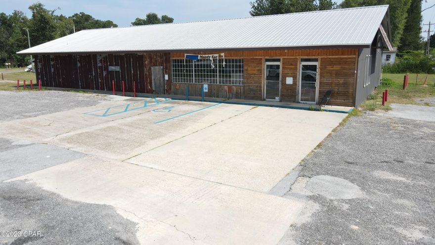 Formerly Moody's Farmhouse Restaurant, this free-standing commercial building sits right on Highway 77 in the heart of Wausau, just minutes from Chipley and Sunny Hills. With ample parking and street to street access, this location is ideal for any retail user. This property is in a prime location to attract customers traveling to and from Panama City and Panama City Beach while also maintaining a steady stream of local customers. The building has been recently renovated with new A/C unit, roof, & exterior updates.  All measurements are approximate and should be verified. Also available for lease.