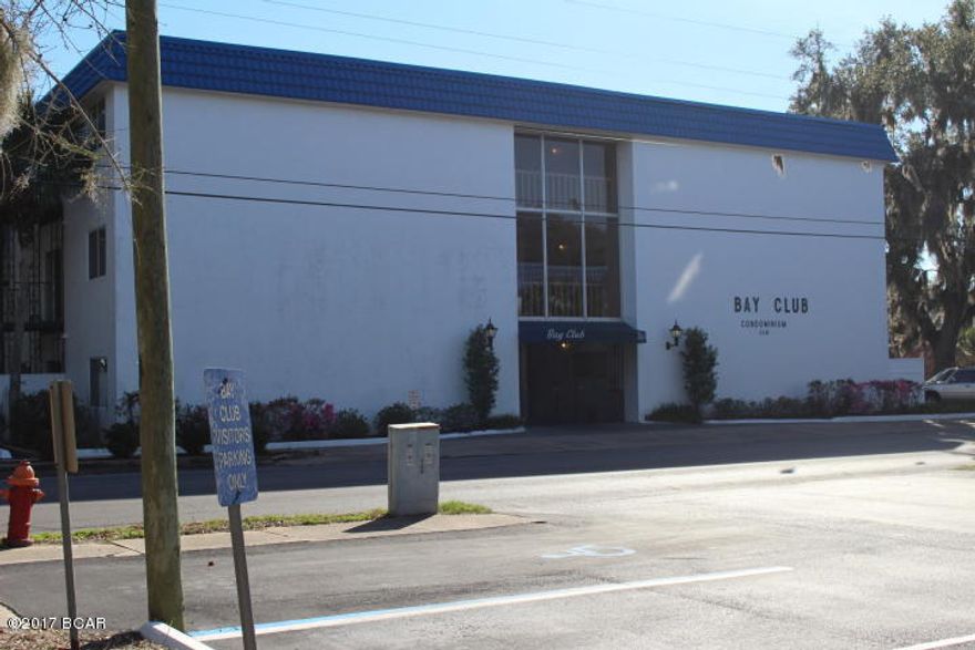 Enjoy living on St Andrew Bay with community pool and dock.  This 3rd floor unit has a bay view from the balcony off the living room.  Take the elevator or walk the stairs.  Two bedroom, 2 bath home has carpet in the living room / dining area and bedrooms.  Vinyl flooring in the kitchen and bathrooms.  A full size  stackable washer and dryer will convey.  All white appliances in the kitchen.  AC unit was replaced in 2012.