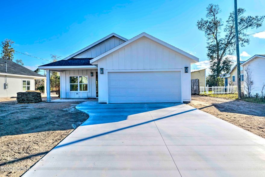 Under Construction - Completion in 60 Days!



This stunning 1,253 square-foot, 3-bedroom, 2-bathroom home is just 30 days from completion, crafted with quality finishes and thoughtful design. The exterior features charming board and batten siding with fresh landscaping for excellent curb appeal. Inside, raised ceilings enhance the open, spacious feel, paired with durable LVP flooring throughout. The kitchen and bathrooms showcase high-end countertops, adding a modern touch.



The primary bathroom is a true retreat, featuring a custom-tiled shower and a separate soaking tub for ultimate relaxation. Please note: Photos are from a previous home, showcasing the type of finishes and quality you can expect in this build. Located just a 5-minute drive from all the shopping and dining options in Lynn Haven, this home offers both convenience and style. Don't miss out on this exceptional new build.