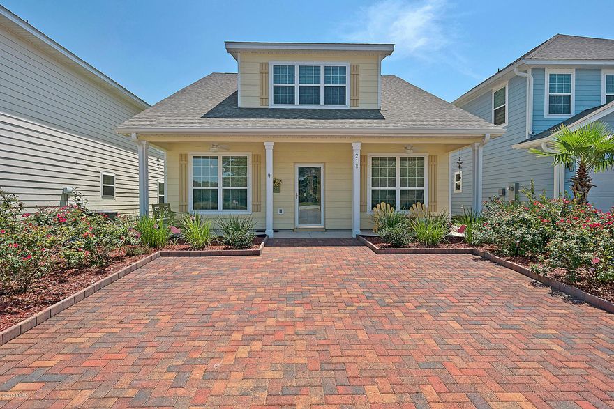 Priced to sell! Precious and beautifully filled with light, this home is perfect as a permanent or 2nd home in the very popular lake-oriented neighborhood of Turtle Cove.  Home is Craftsman-style with many upgrades from its original design including 9''crown molding throughout.  One of my favorite parts of the home is the darling fenced in back yard with a new sun shield covering and a perfect little storage building.  The front is adorned with a covered porch perfect for late afternoon rocking on the porch.  The family room is tiled with adjoining dining and or sitting room attached to the eat-in kitchen with new tiled back splash, granite countertop, new stainless under-mount sink, new faucet, custom cabinetry and GE Stainless appliance. One of three bedrooms is on the 1st flr. The master bedroom upstairs is spacious with a work or sitting area, huge walk-in closet and large bath with room to spare. The third bedroom is also large with a private bath. The laundry room is conveniently located upstairs between the bedrooms. There is plenty of storage with 2 finished areas above the dormers. Home is perfectly located near Pier Park to the east and Rosemary Beach to the west. Airport is a short 20 minute drive. Turtle Cove has incredible amenities including a gorgeous clubhouse with workout facility, swimming pool, tennis courts, boat dock and park amphitheater.