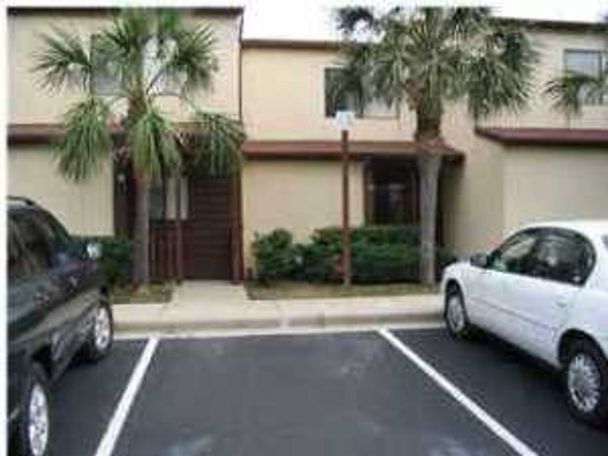 Great 2 bedroom townhome located on the West end of the beach. Small community with club house and pool. Unit features 1/2 bath downstairs, covered patio, and private balcony off of the master.