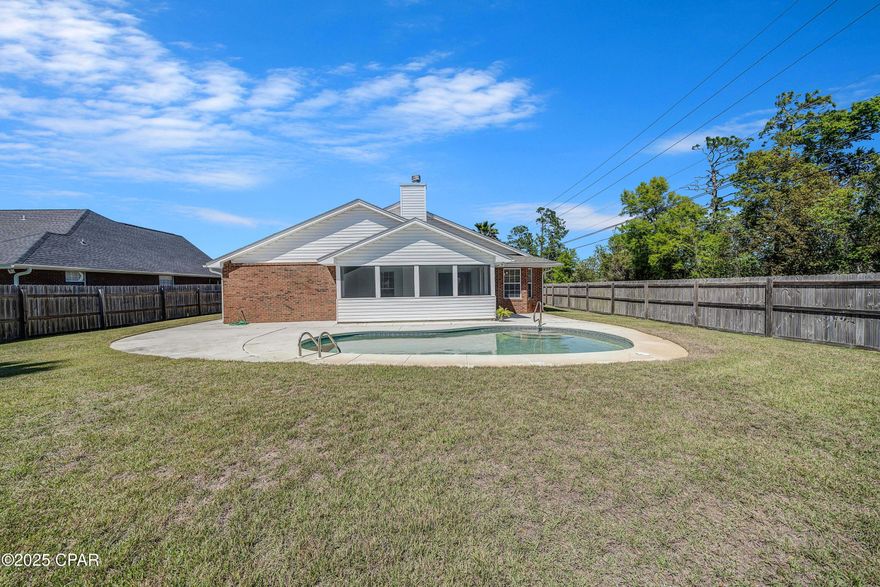 BRICK HOME WITH  POOL!  Welcome to 501 Floridian Place, a 3 bedroom, 2 bath home with 2 car garage and fenced-in backyard.  Enjoy a split bedroom floorplan, vinyl plank floors, woodburning fireplace, and kitchen with stainless appliances and pantry.  Brand new HVAC inside and out!  You have an awesome garage with separate storage/workshop area that opens to the backyard, and also opens to your laundry area, complete with large laundry sink.  Step out back to relax and entertain and enjoy your screened-in porch, spacious fenced backyard and pool and patio!  This is a fabulous location centrally located to all in Panama City, on a cul-de-sac street, also steps to a beautiful city park, complete with walking trails and playground.  Call today to see this great house your next home!  Move in ready! You can be in for the holidays!