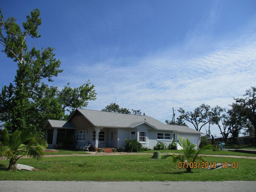 SELLER WILL CONSIDER ALL OFFERS. Cash/Conventional financing. Florida cottage features  4 bedroom, 3  bath. Large bright great room with terrazzo and tile flooring through out.  Galley kitchen  fully equipped with new appliances, exotic  granite counter tops, tile back splash,,  new sink and faucets, wine fridge and wine rack, plenty of cabinets.  Minimal hurricane damage.  Seller has updated all major items and is selling as is. New A/C , roof,  electrical and  plumbing including toilets and sinks.  New plantation blinds in boxes to convey with the purchase.  Water view on 3 sides. Bay access within walking distance.  Pubic boat launch near property.  This property can be purchased with the adjoining property located on the bay MLS#676742.  Property is occupied  Listing agent mus viewing.