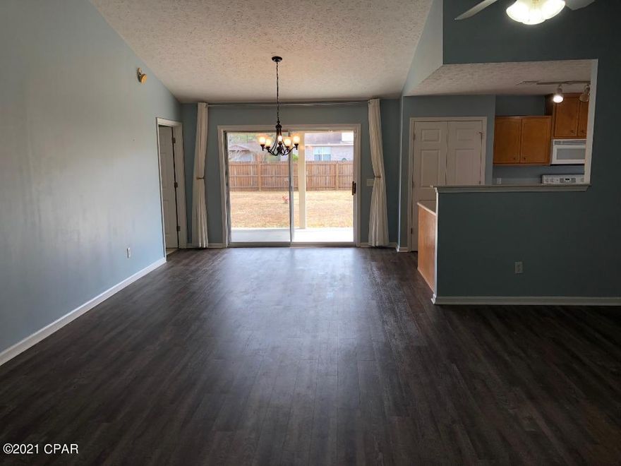 CURRENTLY UNDER CONTRACT, SELLER ACCEPTING BACKUP OFFERS   4/2 in Lynn Haven, LVP flooring in family, dining and kitchen, 2-car garage, large fenced backyard w/ a covered open patio. Gas heat and water heater, w/d hook-up. ** Note- pics are from when last vacant. Tenant occupied, pls allow 24hr notice for showings ** All sizes including rooom measurements are approx., verify if important.