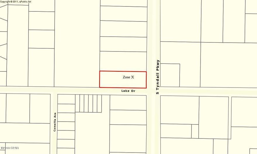 This great corner lot is .69 acres, and has approx. 100' of highway frontage. Ingress and egress are a cinch, as there are both a north bound turn lane, accessing the property at Lake Drive, as well as a median cut at the northern end for an additional entrance, already in place. Located in Flood Zone X, and zoned General Commercial (per Parker Zoning Office), this great location would be perfect for any number of commercial businesses. Traffic count per DOT is 24,500 to the north and 19,200 to the south. Property is located half way between the Callaway Super Walmart and the Tyndall Bridge, and won't last long. Additional, contiguous parcels also available., totaling 7.5 acres, MOL.  Measurements approx.