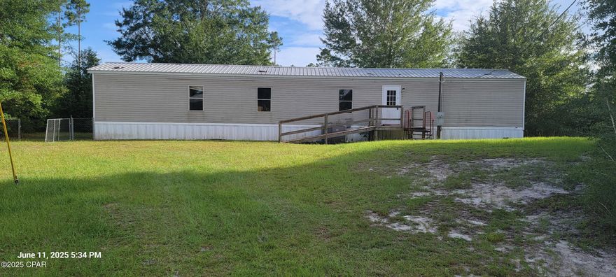 Peaceful Country Retreat Just 40 Minutes from World-Class Beaches

Tucked away in a quiet, country setting, this charming property offers the perfect blend of tranquility and convenience—just a short 40-minute drive to some of the world's most beautiful beaches.

The home features a spacious, fenced backyard, ideal for pets, play, or relaxing in privacy. A large screened and covered porch provides the perfect space for outdoor enjoyment year-round. Additional storage is available in the on-site shed.

Inside, the home boasts a desirable split floor plan. The master suite is located on one side for added privacy, while two additional bedrooms and a full bath are situated on the other. A durable metal roof and select disability access features add lasting value and functionality.

Whether you're seeking a peaceful getaway or a full-time residence close to nature and the coast, this property has plenty to offer.