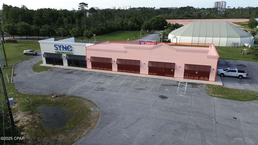 +/-7,000sf commercial space with excellent visibility and frontage on Panama City Beach Parkway. Located in a high-traffic area with 52,000 AADT, near major retailers, restaurants, and hospitality such as: Publix, Home Depot, Chick-fil-A, and CVS. Features an open floor plan and 5 parking spaces per 1,000 sf. Ideal for businesses seeking a prime, accessible location.