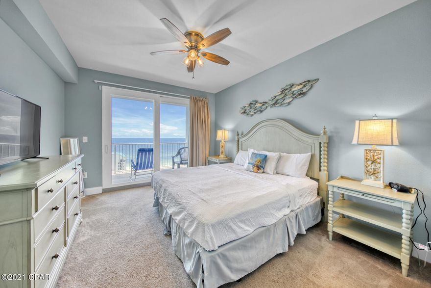 Beautiful turn key 2 bed, 2 bath PLUS bunk room condo that sleeps 8 with GULF VIEWS, even sunsets!!!! Largest units on PCB. New AC 2021.... It is currently generating income and bookings will convey ready for you!!! The bedrooms are large and the bunk room provides more storage. Main bath boasts large garden tub and walkin shower. Amenities include 5 pools, 2 hot tubs, putting green, large fitness room overlooking the Gulf, light show nightly at 8pm. It's within walking distance to Walmart, shopping, Pineapple Willies, and 3 public beach accesses directly across the street. All measurments to be verified by buyer if important