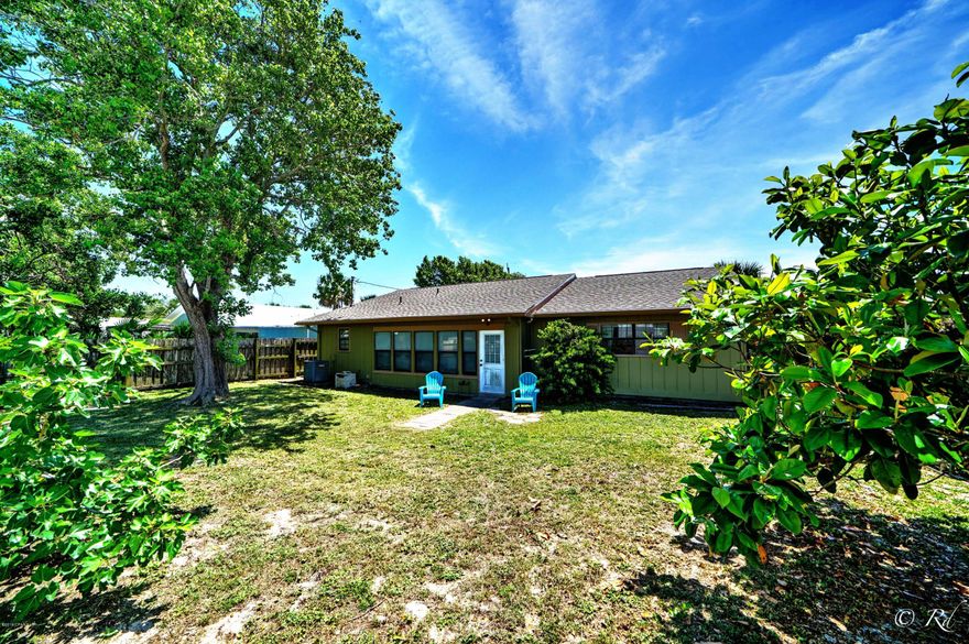 'CURRENTLY UNDER CONTRACT, SELLER ACCEPTING BACKUP OFFERS' Florida Beach Cottage perfectly located in Laguna Beach just one and a half blocks from the beach!  An easy walk or Golf cart ride takes you to Beach Access 80 and 81 and directly to the beautiful white sandy beach and the Gulf. NEW ROOF in January 2019. Good floorplan with spacious rooms including a sun room! Large 60 x 120 lot with fully fenced back yard. No HOA fees. Your Beach house awaits! Call today!