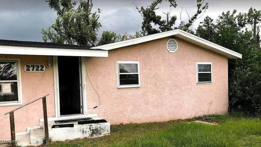 CURRENTLY UNDER CONTRACT, SELLER ACCEPTING BACKUP OFFERS. Check out this 4BR/2BA home, situated on a large, approximately .396 acre lot, and located close to Tyndall AFB and 23rd Street.  Recent updates include a new roof, new sheetrock and insulation, new wood-look Trafficmaster flooring, 3 y/o HVAC, and new shower/tub inserts that are on the premises and ready to be installed.  Needs final finishing touches such as paint, vanities, kitchen cabinets, some flooring, light fixtures, etc., and after renovations are made, this property can be used as a rental property or primary residence. Both outdoor storage buildings, including the 10x12outdoor storage building, in the back yard convey with property.  Call today to see this property in