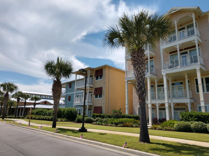 New Paint and Carpeting in this Island Reserve 3rd Floor Condo! This is a 1 bedroom 1 bath w/study. 10-foot ceilings, crown molding, bamboo and tile floors in the open living/dining/kitchen impress. Kitchen features granite counters and island, under cabinet lighting, disposal, and GE stainless steel appliance package w/fridge, glass top stove/oven, microwave, dishwasher. Full size washer and dryer in the laundry room. This gated community is truly an oasis at the beach. Resort style lagoon pool w/lap area, zero entry, and waterfall. Indoor basketball court, fitness center, game room and theater. Low HOA fees include water, sewer, garbage, landscaping, amenities, security. This condo is ideal as a permanent home, vacation getaway, or investment for rental income. Perfect for all buyers! This is a third floor condo. Parking on third level is available and there is covered breezeway and entry to condo. Unit 7317 has been a long term rental since new. This property has been grossing over $13000/year and stays rented easily. Island Reserve is highly sought-after for long term leasing. This condo is in the perfect location; close to the beaches, close to the military bases, close to Pier Park, close to Panama City. Shopping, eating, and entertainment are all around you here. Island Reserve is an Oasis at the Beach!