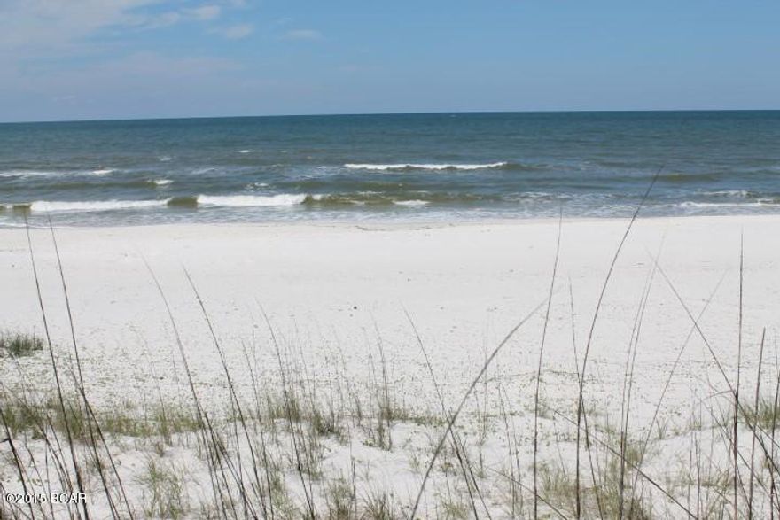 Paradise awaits you in Cape San Blas!  There is only so much beach waterfront property available.  Here is your opportunity to purchase your very own sugar white sand beach front property right on the Gulf.  This vacant lot is your canvas to design and build your perfect beach front home.  Cape San Blas in Port St. Joe is an area like no other.  It is not like the typical beach town.  It is very quiet, laid back and private. Port St. Joe is right beside Mexico Beach, and only an hour drive to Panama City Beach.  Tallahassee, Florida is only a couple hours away as well.  Public water and sewer connection is available for this property.  Water connection would be $3500 and sewer connection is estimated at $10-$11,000. Or you can have a septic tank placed on the property.