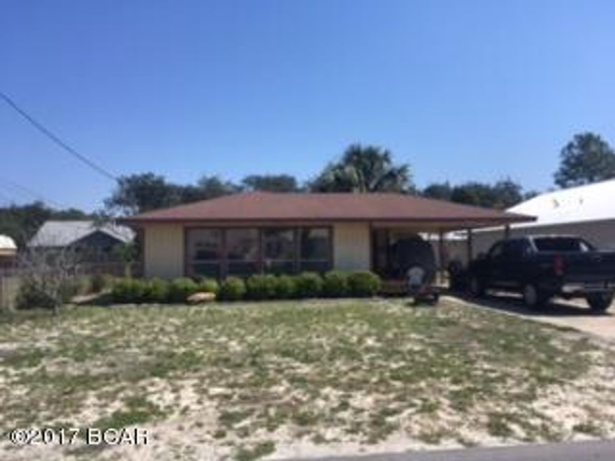 Walk to the beach...Rare single family home under $200,000!  60x120 lot partially fenced, plenty of room to add a third bedroom.  No HOA fees, close to Hutchison Beach Elementary School and Maggie Still park.  2BR/2BA carport, large bedrooms.