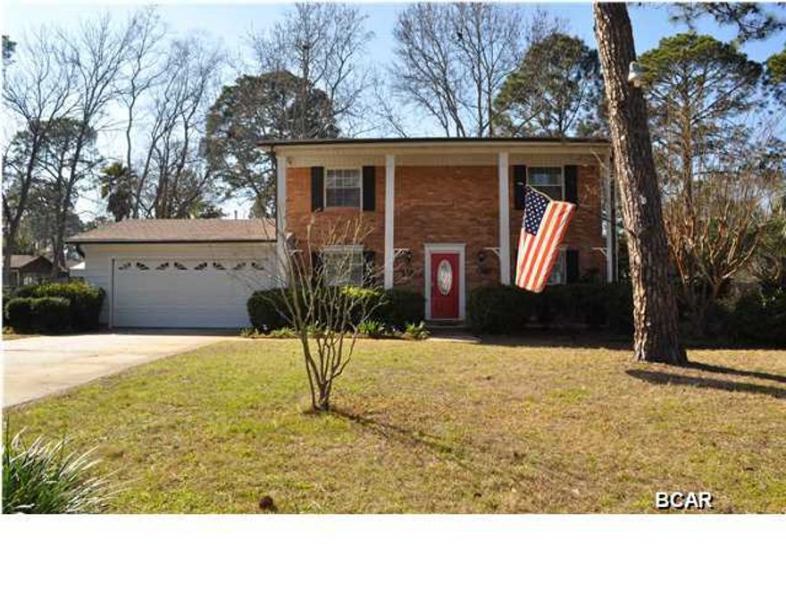 This is truly a remarkable and move-in ready 4BR/2.5BA home in the St. Andrews area of Panama City. The sellers have been busy updating the property so all you have to do is bring your furnishings and family and start living! Some of the most recent improvements inside include a totally remodeled kitchen with custom Ethridge cabinetry and banquette seating in the breakfast room, custom built-ins in the family room and the formal living room, all new carpet and fresh paint, and even the stairs have been rebuilt. Outside updates include new windows and siding! Within the confines of the privacy fenced backyard you'll find a gas grill with hookups to the main line (no messy tanks to deal with!), a deck perfect for outside dining, a storage shed and a sprinkler system. There's also  several fruit trees dotting the landscape including orange and Satsumas and a grape arbor. This home is nestled within a quiet, family-friendly neighborhood and you're just around the corner from shopping, schools, and more! All info is approx. and must be verified by Buyers if important.