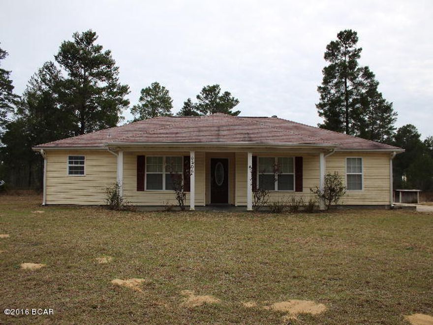 PRICE REDUCED * This lovely contemporary home is almost like-new built in 2005. Has very nice features that include a large living room with fireplace, modern kitchen with smooth surface range, dishwasher, a pantry and breakfast nook. There is even an office! Has split bedroom design with large corner garden tub, double sinks and a separate shower in the master bathroom. There is a concrete patio in back and a concrete parking pad. All of this is situated on 9.539 wooded acres in the county in what appears to be a quiet setting. NOTE: There is no septic tank or driveway on this property. All is on adjoining property which may be purchased separately for $17K. Room sizes are estimated.