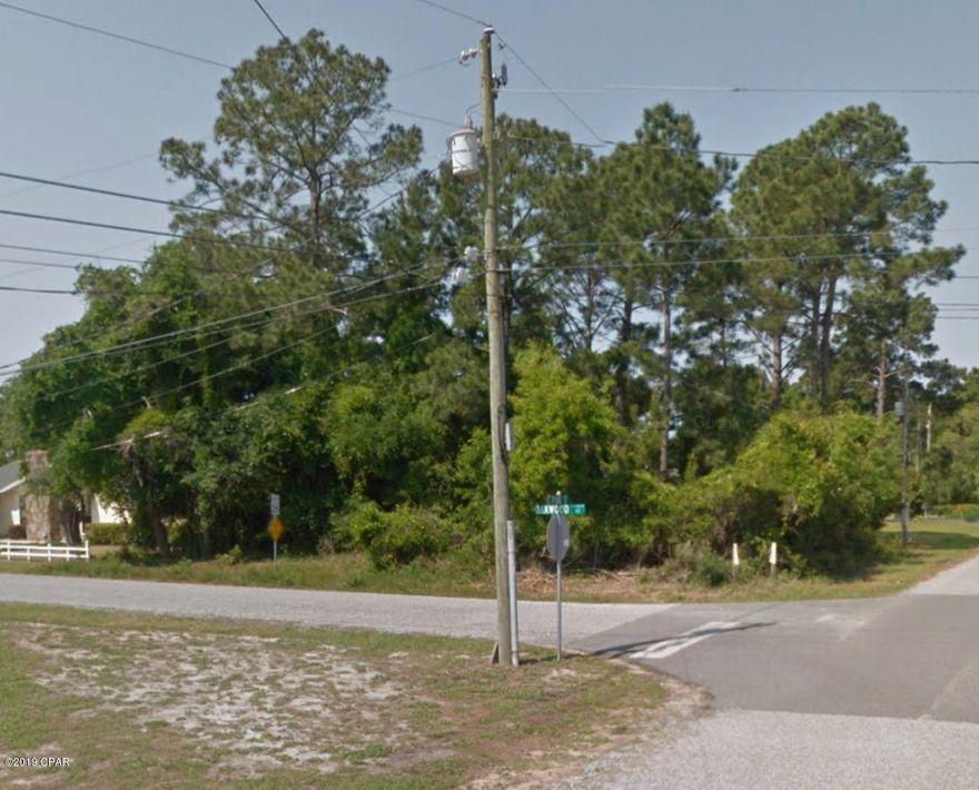 Panama City Beach corner lot in nice, quiet neighborhood.  Close to shopping and restaurants.  Great location to build a home.