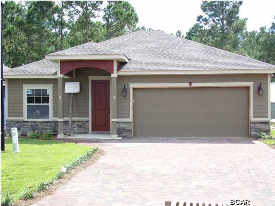 New Construction at Hidden Ridge! SELLER WILL PAY $5000 TOWARDS CLOSING COSTS!! Hidden Ridge is a New 21 Home, Secluded Subdivision in Lynn Haven off Hwy 390. Hidden Ridge has Underground Utilities, Paver Driveways, Sidewalks and Decorative Street Lights. This beautiful 4 Bedroom, 2.5 Bath New Construction Home features 9/10 Foot Ceilings, 20 inch Porcelain Tile Flooring throughout Main Living Area and Bathrooms. The Kitchen has All Wood Cabinets, Granite Counter Tops with under Mount Sink, Breakfast Island and Whirlpool or Maytag Stainless Appliances. Some of the Standard Features include: Tremendous Master Walk-In ''Step Down'' Showers with 2 Shower Heads, 8ft Interior Doors, Crown Molding, Paver Driveways, Upgraded Carpet and Pad 14 SEER Heat Pumps, Anderson LOW E Double Paned Windows, Radiant Barrier Roof Decking (Reflects Heat Away), and a Security System. Put Hidden Ridge and this wonderful New Home at the Top of your List of Places to See.