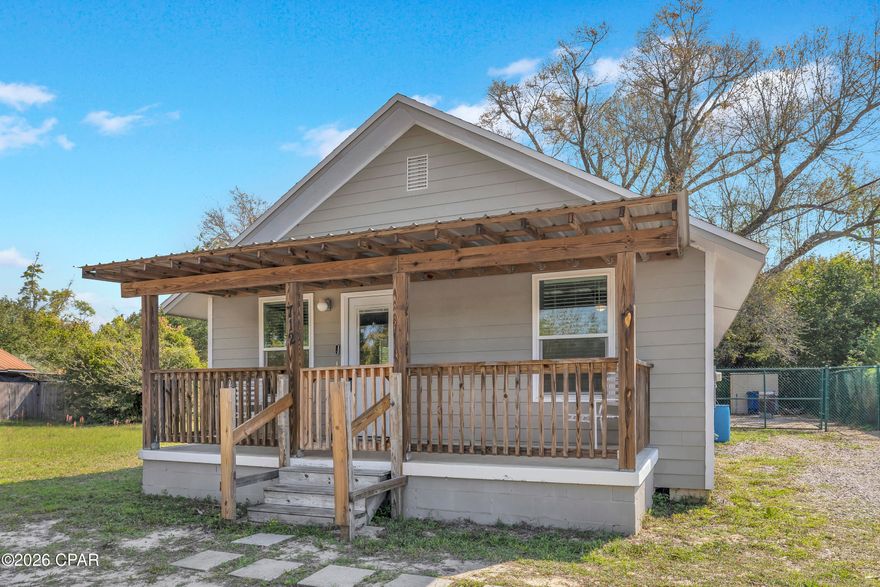 MOVE-IN READY | ESTABLISHED NEIGHBORHOOD | NO HOA
Panama City, Florida | Priced at $200,000, this detached single-family home offers a centrally located opportunity with a spacious, newly fenced backyard.
Renovated in 2020, the home features LVP flooring throughout and an open floor plan connecting the living area and kitchen, complete with stainless steel appliances.
The layout includes two bedrooms connected by a Jack-and-Jill bathroom, along with a second full bathroom located off the laundry area. A bonus room, currently configured as a sleeping area, provides flexible use for a home office, guest space, or additional living area.
The laundry room offers exterior access to the backyard, enhancing functionality for everyday use. Outside, the fenced yard provides usable space for outdoor living, storage, or pets.
A covered front porch with railings and a gate adds to the home's curb presence, while the surrounding established neighborhood features streets lined with mature trees--offering a setting distinct from newer construction areas.
Positioned in a convenient Panama City location, this property presents a practical option for buyers seeking value, flexibility, and usability without HOA restrictions.
All information is deemed reliable but not guaranteed; buyer to verify if important.