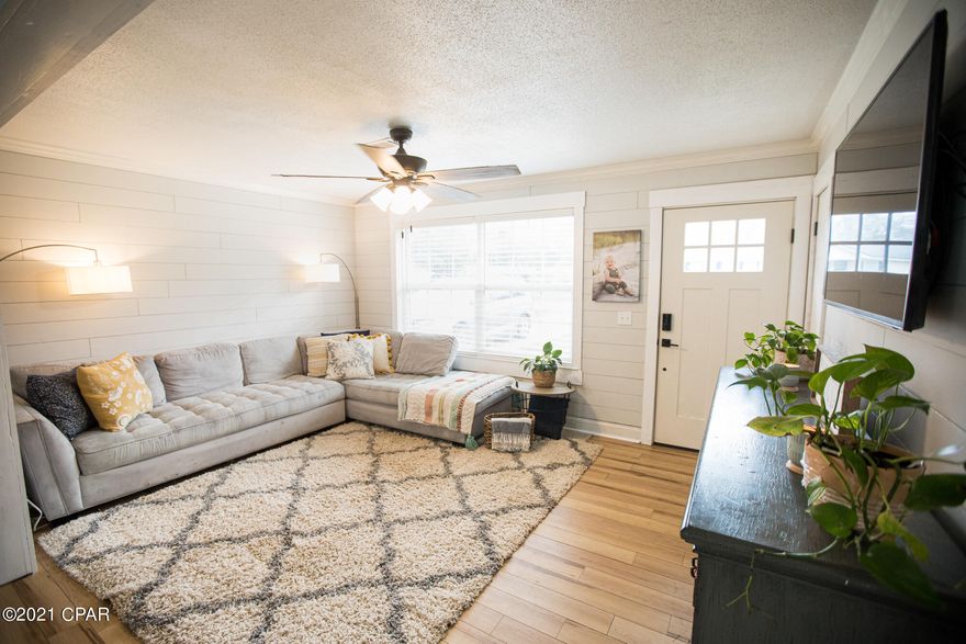 Captivating brick beauty that has been completely renovated is awaiting its new owners. This 4-bedroom, farmhouse inspired interior features an open concept living/dining/kitchen with granite countertops, stainless steel appliances, tiled backsplash, and pantry. Other inside features include vinyl plank flooring throughout, remodeled bathroom with custom tile work, crown molding, new windows/doors, and shiplap accent walls. Outside you will find a privacy fenced back yard, rear patio, portable storage shed, landscaping and concrete driveway. This home is conveniently located near schools, shopping and restaurants and walking distance from downtown.