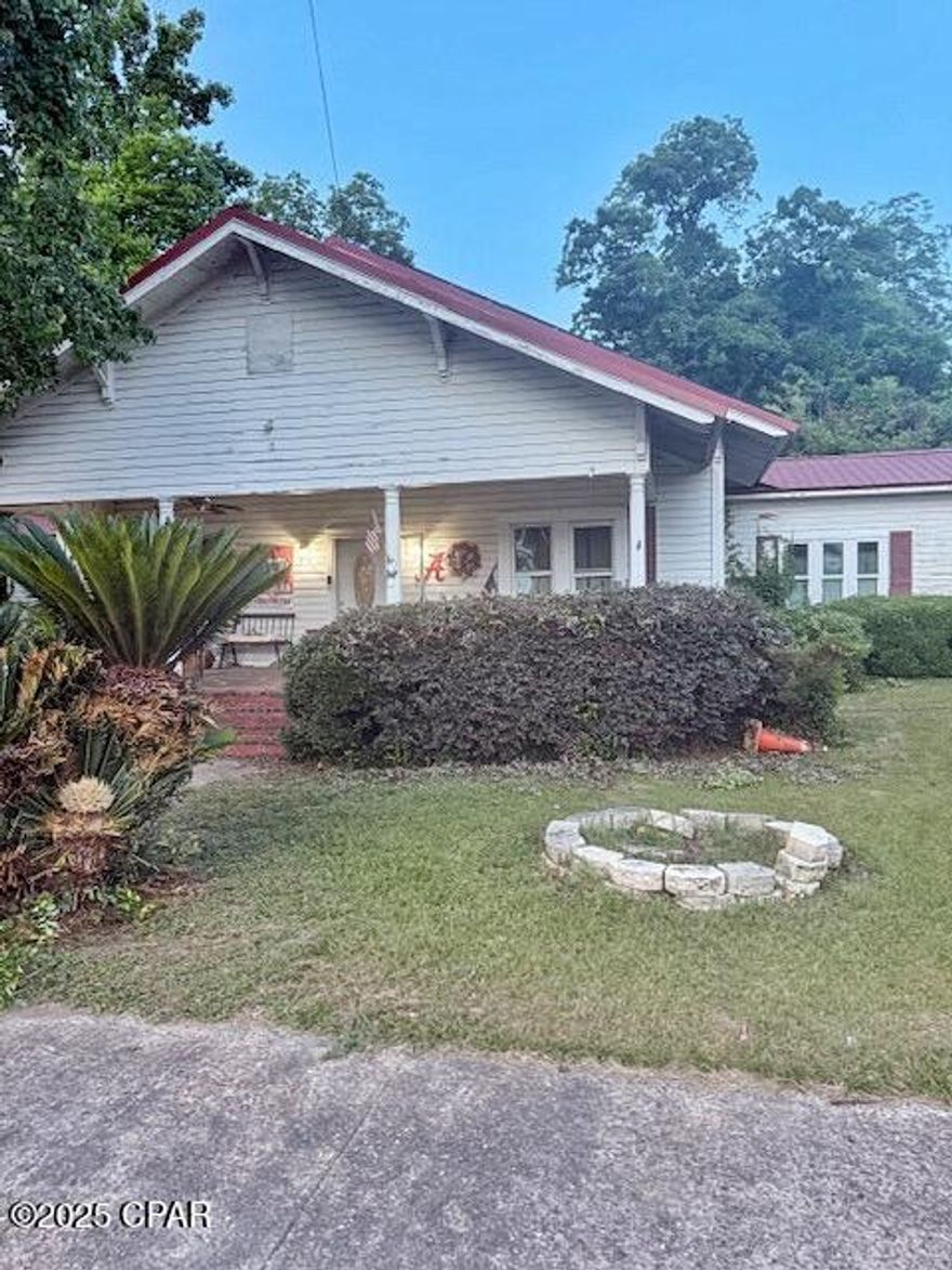 Spacious 4-Bedroom, 3-Bathroom Home in the Heart of Malone, FL

Welcome to this beautifully unique 4-bedroom, 3-bath home situated right in the heart of Malone! Thoughtfully designed with character and comfort in mind, this property blends timeless charm with modern convenience.

Step inside to find a spacious open-concept layout featuring a large kitchen with custom wood cabinetry and solid surface countertops, flowing seamlessly into the living and dining areas—perfect for everyday living and entertaining. Bamboo wood flooring adds warmth and elegance, while the original tongue-and-groove wood wall coverings give the home a distinctive, cozy feel. Most rooms boast soaring 12-foot ceilings, enhancing the home's open and airy atmosphere.

The versatile 4th bedroom, located just off the main living area with French doors, offers the perfect setup for a guest room, home office, or studio. A second living space showcases a stunning vaulted wood ceiling, a floor-to-ceiling brick fireplace, and direct access to an expansive concrete patio—ideal for outdoor gatherings. 

The master suite features its own ensuite bathroom and a private sitting area between the two spaces, offering potential for a walk-in closet, reading nook, or quiet retreat.

Outside, enjoy a fully privacy-fenced backyard, a wood-framed storage building, a deep covered front porch, and an attached carport. 

This charming and spacious home has all the room you need, inside and out. Don't miss your chance to own a piece of Malone living—schedule your private tour today!