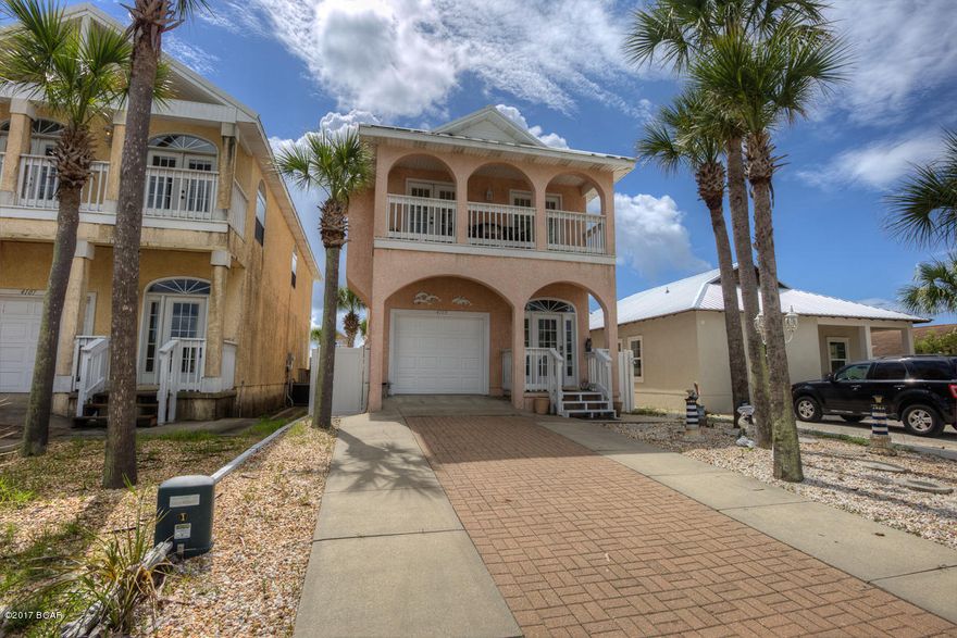 This Beautiful Remodeled Home is just a few steps to the Emerald Green Waters of the Beach. You do not have to cross any main streets to get to the Beach. Home has a View of the Beach and is ready for the next family to be used as a Fabulous Home, a Second Home or an investment with NO HOA or fees. Home features an electric Fireplace which turns on with switch, Silver Pearl Granite Counter Tops, Stainless Appliances which were new when they remodeled in 2013, Touch Sink Facet, Hardwood Floors, 2 Balconies which are off the Great Room and Master Bedroom and a Porch off the second Bedroom down stairs which leads to the 10 feet Private Pool with outside shower with hot water. Single car garage which is heated and cooled would very easy to convert to a 4th bedroom, game room or den.  Can park Can park up to 4 cars in driveway. If measurements are important, please measure.