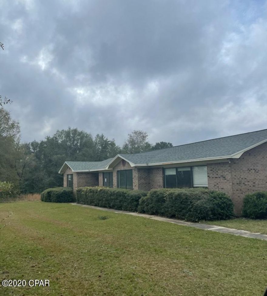 Large 3 Bedroom 2 Bath Brick family home with 2286 in Campbellton sitting on 5 acres! Attached 2 car garage. Large Family room plus living area. Home has some updates such as newer roof, updated cabinets in kitchen and bathroom. Home still need some updates but can be made into the perfect home. Call today for more information! Owner Occupants only.