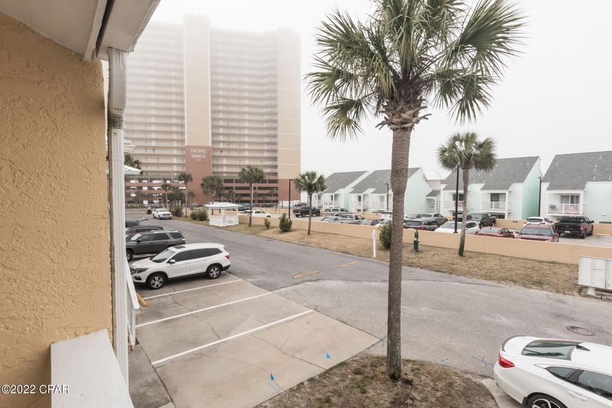 Easy to finance as a primary home, second home or Investment property. Fixed rate mortgages with low down payments are available on this property. Across the street from the white, sands of the Gulf of Mexico! Wendwood units are rarely available; nicely maintained, small complex NO association fee and you own the land!  Fully furnished rental ready END unit townhome Rental projection is $40K + You have two deeded parking spaces! New dish washer, washer & dryer, new hurricane impact windows and sliding glass doors with lifetime guaranteed repair or replacement.



Optional Community Amenities Agreement, $391.52 a quarter: Includes the use of the pool, clubhouse, dumpster, WOW cable & internet, and ground maintenance.