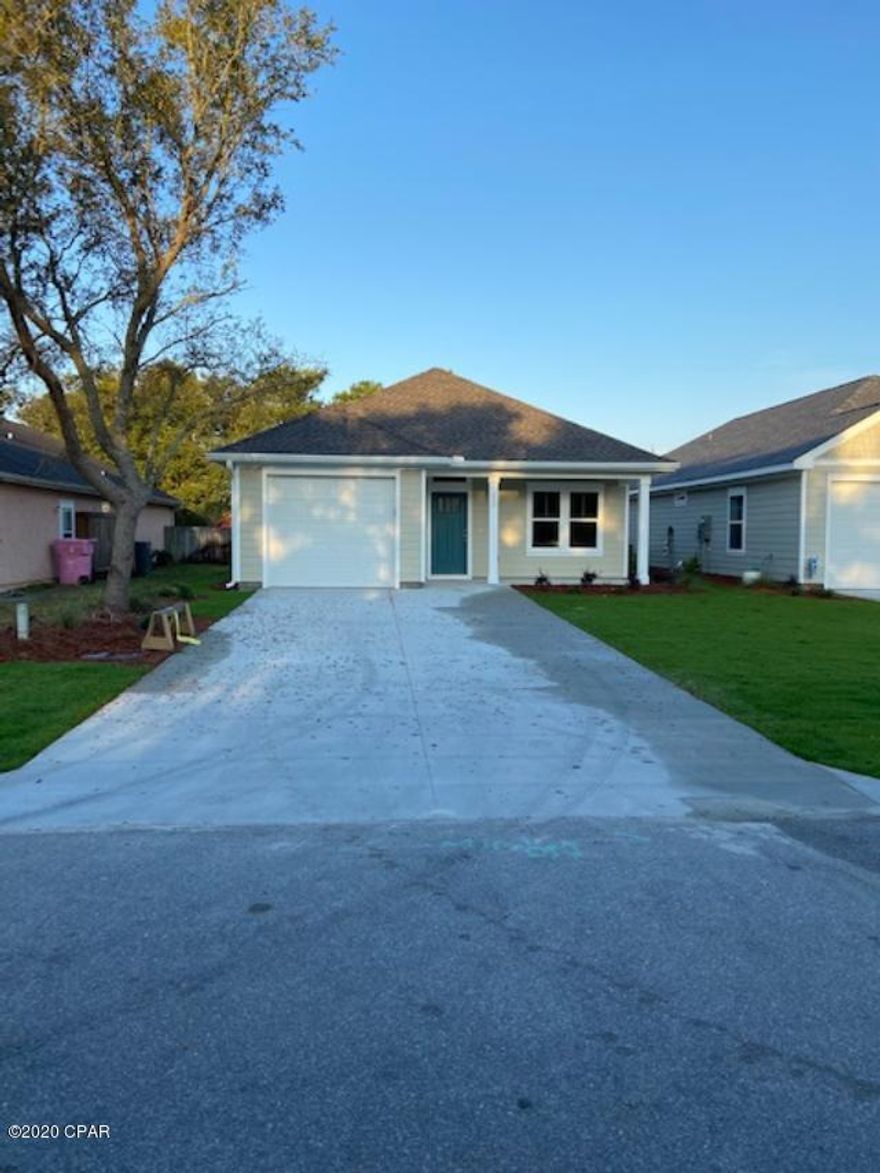 BEAUTIFUL BRAND NEW HOME ON DESIRABLE WEST END! PRIME LOCATION south of PCB Parkway on a dead end street. No traffic, no thoroughfare. 3BR/2BA w/garage in quiet community less than 5 miles to 30A, approx 6 miles to Pier Park, and 3 blocks to The World's Most Beautiful Beaches at public beach access #93. 9' ceilings with trays in L/R and master bedroom, 2x6 exterior walls, popular luxury vinyl plank flooring through out with carpet in bedrooms only, real wood shaker style cabinets w/ soft close drawers, granite counter tops, tumbled marble kitchen back splash, stainless steel appliances, custom trim work, fully landscaped with irrigation system, large fenced in back yard, and more!