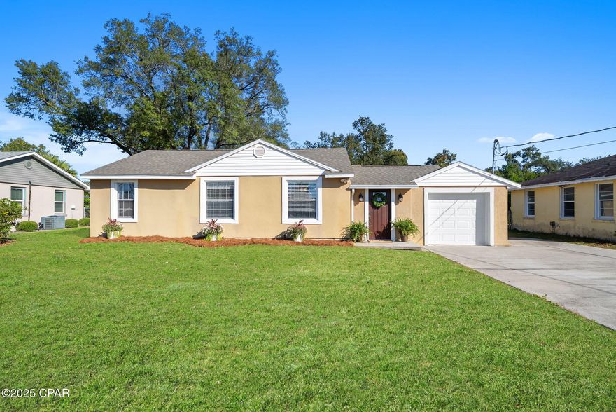 Welcome to your new  home in the highly sought-after Cove neighborhood in historic downtown, Panama City! This delightful 3-bedroom, 1-bathroom residence, originally built in the 1940s, combines timeless charm with modern updates. Step inside to discover a beautifully maintained interior that showcases the character of an older era while offering contemporary comforts.

Recent updates include a roof after Hurricane Michael, a new HVAC system, ensuring durability and energy efficiency for years to come. The spacious layout features inviting living areas, perfect for family gatherings and entertaining friends. The property also boasts a convenient one-car garage, along with a newly paved driveway and alleyway access at the back of the home.

Situated just steps away from St. Andrews Bay Yacht Club and the water and mere minutes from downtown Panama City, this home's location is unparalleled. Enjoy easy access to the yacht club, picturesque Beach Drive, and all the amenities downtown has to offer, from trendy shops and delectable dining to vibrant nightlife.

Don't miss the chance to own a piece of history in one of Panama City's most desirable neighborhoods. Schedule your viewing today and fall in love with this charming cove home!