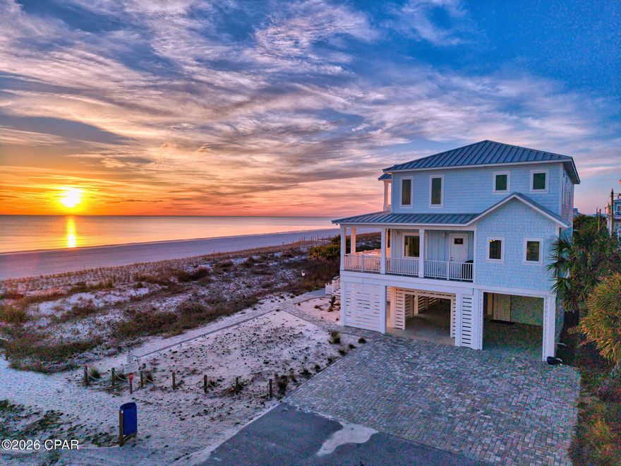 Gulf Front Coastal Elegance in Mexico Beach, Florida. This exquisite coastal retreat is a harmonious blend of contemporary sophistication and timeless charm, meticulously designed to embrace the breathtaking natural surroundings. Constructed in 2022 with cutting edge Insulated Concrete Form (ICF) engineering, this residence exemplifies superior craftsmanship, durability, and an unwavering commitment to modern design. This remarkable property boasts five spacious bedrooms, four full baths, and two half baths, ensuring ample space for family and guests. A private elevator effortlessly connects all levels, enhancing convenience and accessibility throughout the home. The main living floor features a magnificent great room that showcases panoramic Gulf views, allowing for unforgettable sunsets and serene coastal vistas. This space seamlessly flows to an expansive beachfront deck, ideal for entertaining or simply savoring the soothing ocean breeze. Culinary enthusiasts will be captivated by the state of the art gourmet kitchen, outfitted with premium appliances and breakfast bar. This inviting space is perfect for hosting gatherings and creating lasting memories. Adjacent to the kitchen, the spacious entertainment area is designed for relaxation, featuring a ventless gas fireplace and an impressive 85'' television. It's the perfect setting for cozy evenings by the water. The primary beachfront suite is truly a personal retreat, offering direct access to the deck, sweeping Gulf views, a large walk-in closet, and a spa-inspired en suite bath that promises a tranquil escape. The second level is thoughtfully designed with an additional family room, three elegantly appointed master suites with private baths, and a versatile fifth bedroom--ideal for a bunk room or office. This extraordinary home is not just a residence; it's a lifestyle offering unparalleled privacy ,stunning scenery, and refined luxury. Experience coastal living at it's finest!