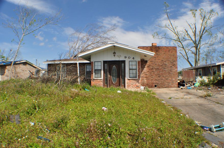 Great investment opportunity!  Rehab this home and flip it or rent it out! This is a 5BR/2BA home with a pool. This home was severely damaged by the hurricane and is not habitable.  The property is being sold ''AS-IS'' and sellers will not be doing any repairs or trash removal.   You're walking distance to Rutherford High School and within 5 minutes drive of the elementary and middle schools.  Don't miss a great opportunity!  All info is approx. and must be verified by BUYERS if important.