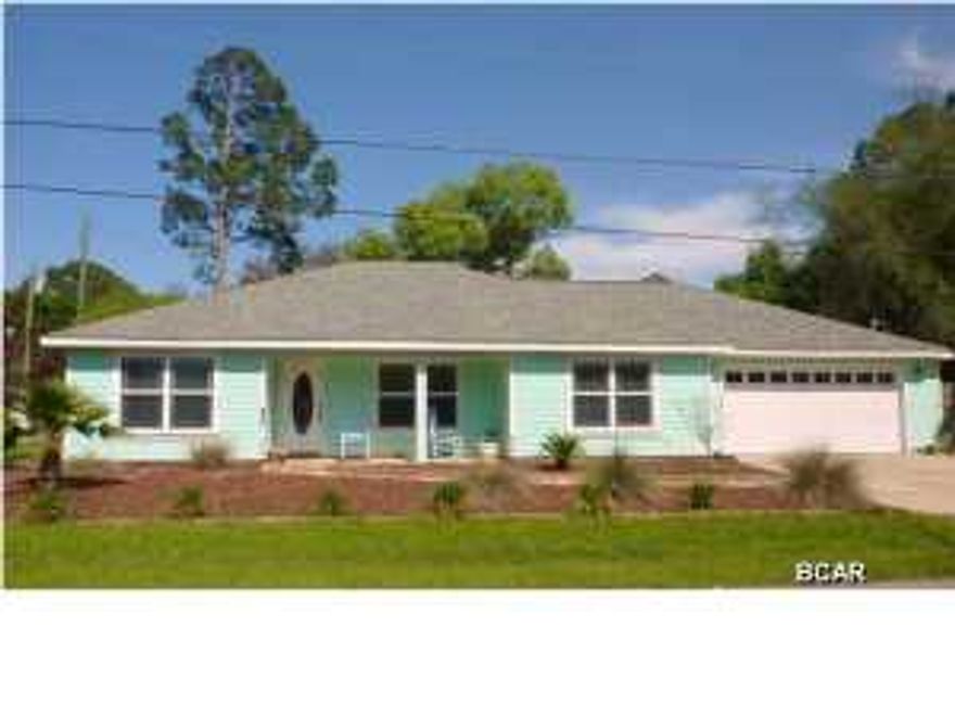 Adorable corner lot home in great location! This 3 bedroom 2 bath home is both spacious and open with a split floor plan and oversized kitchen and living room areas. Home offers a side lot perfect for an RV or boat. Location feels like living in the country but just minutes from the worlds most beautiful beaches. No home owners association and lots of open space in front of the property. The residence features tile and wood laminate flooring, granite breakfast bar and huge open kitchen. Rooms are spacious and in addition to the garage, there is much room for interior storage. Built-in entertainment shelves convey. This property will make a great home for the buyer who has time for the short sale process. Investors!! This could make a fabulous rental home as location is just minutes