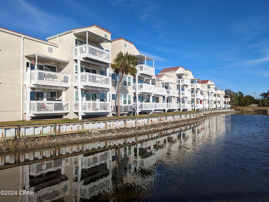 Boaters Dream, Waterfront! 12 foot wide Boat slip with 6000lb Lift, Deep water! Gated! Bayou Pointe Villas 109, 2 bedrooms, 2 full baths, largest floorplan available! Updated top to bottom! Family room and Kitchen are open w/ stainless appliances, quartz counters, LVP floors throughout. Family room has a private balcony, Master Bedroom has its own private balcony as well overlooking Watson Bayou. Updated - Master bath has double vanity and Jacuzzi tub with a view of the bayou from the tub! Boat owners dream w/ dock w/ power and water. Save the cost of boat storage and, own a 2/2 condo with a private slip and boat lift in deep water! Daily sunsets and dolphin are spectacular! Fees include water, pest, trash, cable, internet and insurance. Don't miss this opportunity, take advantage, come visit by boat today!