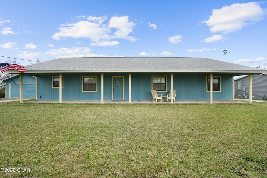 Reduced!!  No HOA fees!!!!! Country living not far from town.  Room for all recreational vehicle, you have a 1/2 acre lot, completely fenced. Home is 3 bedroom, 2 bath. Nice living room.  Eat-in kitchen as well as a formal dining area. Spacious Master bedroom with two closets. The Master bathroom has a tiled walk-in shower and a separate jetted tub.  Another bedroom has a sitting area, that was originally the 4th bedroom. Large heated & cooled sun room across the back of home. Accessible from the master bedroom, or living room. Also a open covered patio. The automotive workshop has 2 roll up doors as well a car lift that does convey. So bring your boat, RV, camper, enjoy your toys & projects. Well with water softener, septic tank. Fireplace is inoperable. Roof replaced in 2019. If important, please verify all measurements.