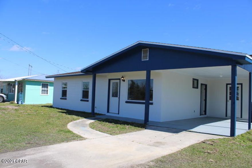 Don't miss this adorable cozy home that has been updated with new windows and doors, floors, tile bathroom, kitchen cabinets, stainless stove, dishwasher, microwave, sink and garbage disposal, counter tops , new lights and ceiling fans and painted throughout the house and that's just the inside. Outside is a large covered patio, new privacy fence, new HVAC, new exterior paint, large utility room, covered carport and a new roof since Michael. This home is move in ready and gorgeous, check it out today.