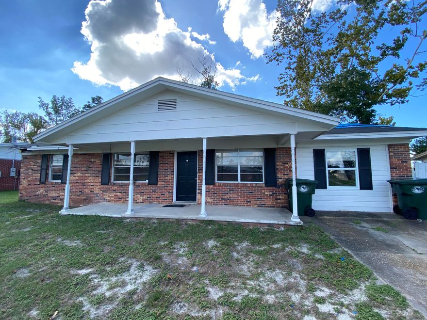 Hurricane Damaged home in desirable Lynn Haven area near Mowat Middle School. 3 Bedroom/ 2 Bath with an enclosed garage that could be converted to a 4th bedroom, with hard wood looking tile & fenced lot. Settling issues, needs new roof, and carpet in all bedrooms.
