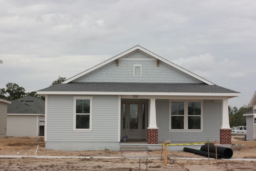 Tour the Orchid model in SweetBay, open daily! Standard features include granite kitchen and baths, stainless appliances including a gas range, walk-in tile-to-ceiling shower and tray ceiling in the large master suite, covered front and rear porches and a beautifully landscaped yard with multi-zone irrigation. Super energy efficient & low insurance rates! Enjoy the waterfront lifestyle and sense of community at Sweetbay with the many parks, amphitheater, resort swimming pool, basketball court, ponds, trail system and boat launch! New home buyers receive priority access to University Academy, Florida's #1 K-8 school! Note: Photos are of the Orchid model home and reflect optional features and upgrades.