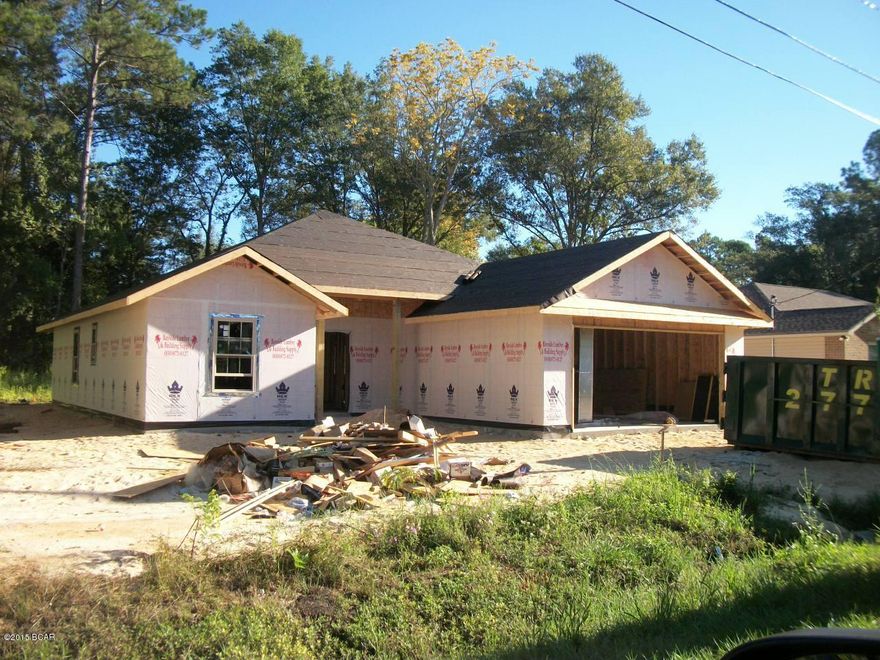 Beautiful new four bedroom two bath.  Raised ceilings with crown molding in the living room and master bedroom, beautiful custom cabinets with Granite counters and under cabinet lighting.  it is still early enough to pick colors and finishes.