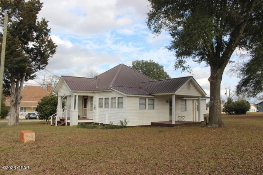 Charming home situated on a desirable corner lot in the Town of Alford! Conveniently located couple of blocks from Hwy 231, offering an easy drive south to Panama City, the beautiful beaches, and Northwest Florida Beaches International Airport, or north a few miles to Interstate 10. This home has been rewired and features a durable metal roof and R-30 blown-in attic insulation for added efficiency. Oversized city lots provide plenty of space for a garden, outdoor living, or future expansion. Priced right for you to make updates and add a garage or workshop to suit your needs!